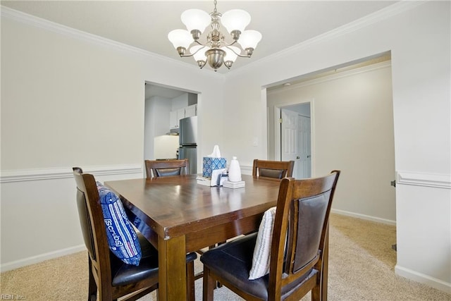 107 Westover Ave Unit 203, Norfolk, VA 23507 - dining room featuring a chandelier, light carpet, and ornamental molding