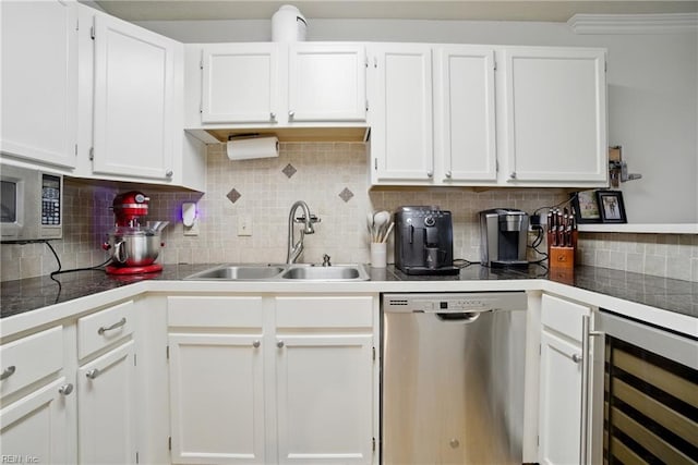 107 Westover Ave Unit 203, Norfolk, VA 23507 - kitchen featuring stainless steel appliances, wine cooler, white cabinets, and backsplash