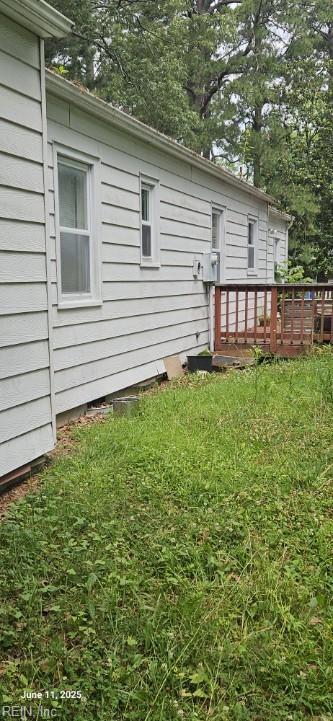 5938 Marshall Ave, Newport News, VA 23605 - back of property featuring a deck, a lawn, and view of scattered trees