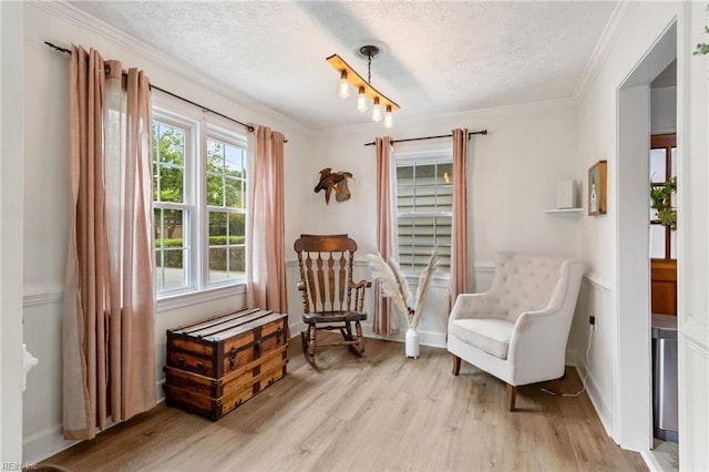 55 Brogden Ln, Hampton, VA 23666 - sitting room with a textured ceiling, light wood finished floors, and ornamental molding