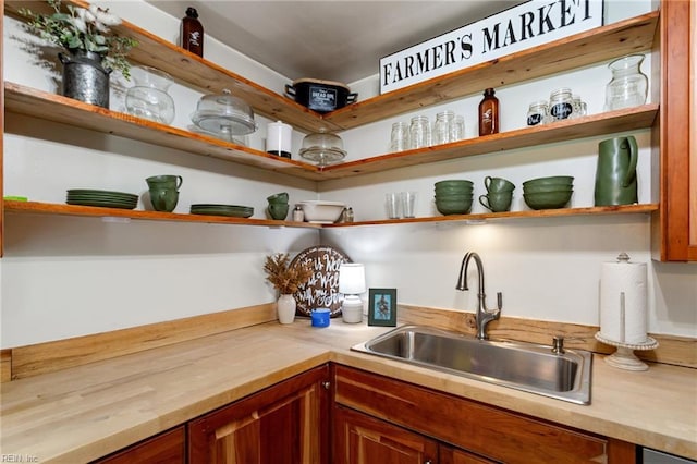 55 Brogden Ln, Hampton, VA 23666 - kitchen featuring open shelves and brown cabinetry