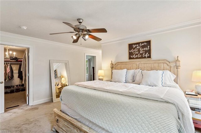 55 Brogden Ln, Hampton, VA 23666 - bedroom featuring light colored carpet, ornamental molding, a spacious closet, a ceiling fan, and a closet