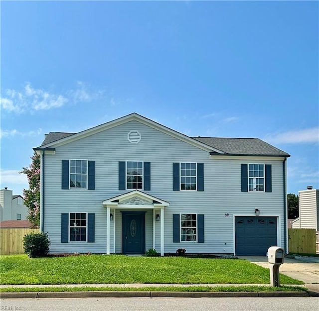 39 Rotherham Ln, Hampton, VA 23666 - view of front facade featuring an attached garage and concrete driveway