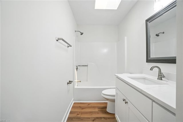 39 Rotherham Ln, Hampton, VA 23666 - full bathroom with vanity, wood finished floors, shower / tub combination, and a skylight