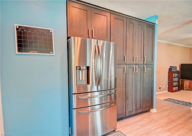 832 Doe Run Dr, Chesapeake, VA 23322 - kitchen with stainless steel fridge with ice dispenser, ornamental molding, light wood-style flooring, and dark brown cabinetry