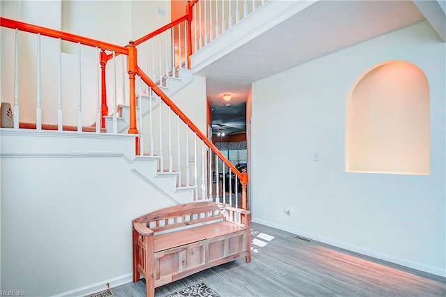 832 Doe Run Dr, Chesapeake, VA 23322 - stairs featuring wood finished floors and arched walkways