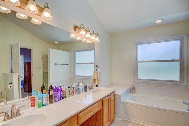 832 Doe Run Dr, Chesapeake, VA 23322 - full bathroom featuring a garden tub, double vanity, and recessed lighting