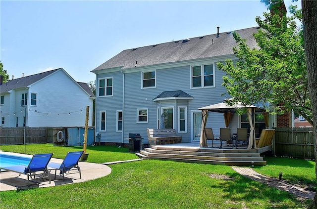 832 Doe Run Dr, Chesapeake, VA 23322 - back of property with a gazebo, a fenced backyard, a wooden deck, and a patio