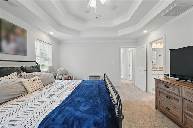321 Pinner St, Suffolk, VA 23434 - bedroom featuring a tray ceiling, light colored carpet, crown molding, connected bathroom, and a ceiling fan