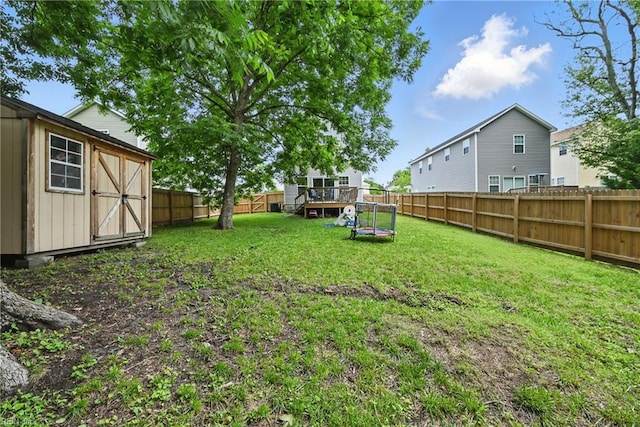 321 Pinner St, Suffolk, VA 23434 - fenced backyard with a storage unit and a deck