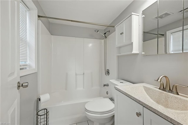 9001 Tidewater Dr, Norfolk, VA 23503 - bathroom featuring vanity, shower / washtub combination, and plenty of natural light