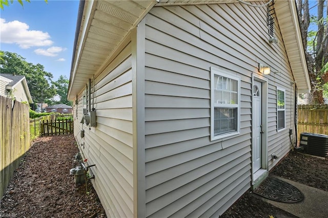 9001 Tidewater Dr, Norfolk, VA 23503 - view of side of home with a cooling unit
