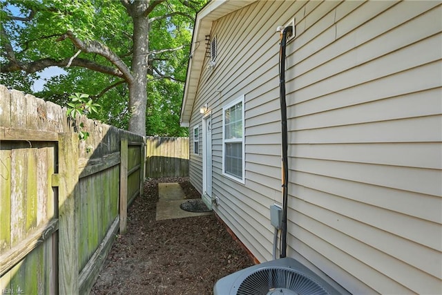 9001 Tidewater Dr, Norfolk, VA 23503 - view of property exterior featuring a fenced backyard and a cooling unit