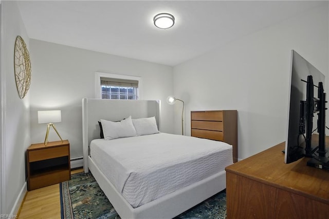 2400 Deerfield Cres, Chesapeake, VA 23321 - bedroom featuring baseboard heating and wood finished floors