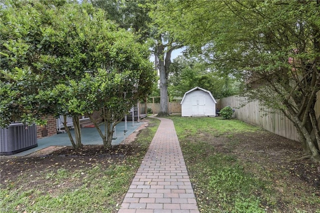 2400 Deerfield Cres, Chesapeake, VA 23321 - fenced backyard with a patio and a storage unit