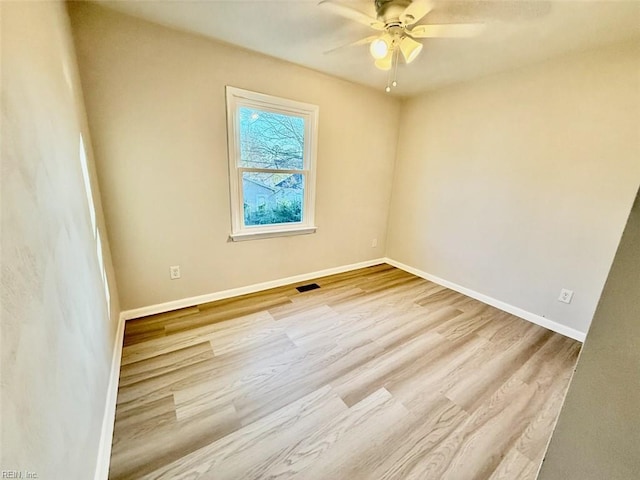 1046 Ivaloo St, Norfolk, VA 23513 - spare room with wood finished floors and a ceiling fan