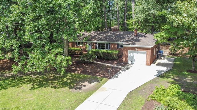 709 Wolfsnare Cres, Virginia Beach, VA 23454 - single story home with an attached garage, driveway, a front lawn, brick siding, and a chimney