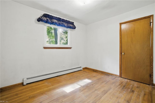709 Wolfsnare Cres, Virginia Beach, VA 23454 - spare room with a baseboard radiator and light wood finished floors