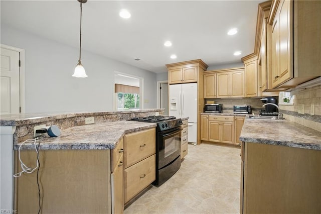 709 Wolfsnare Cres, Virginia Beach, VA 23454 - kitchen with black gas stove, stainless steel microwave, white refrigerator with ice dispenser, light brown cabinetry, and recessed lighting