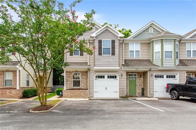 2741 Deep Creek Cmn, Chesapeake, VA 23323 - multi unit property with brick siding, roof with shingles, and an attached garage