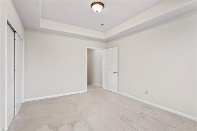 2741 Deep Creek Cmn, Chesapeake, VA 23323 - unfurnished bedroom with a raised ceiling, a closet, and carpet