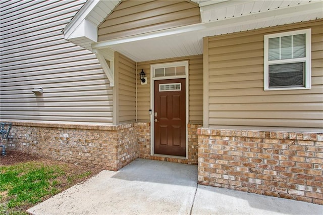2741 Deep Creek Cmn, Chesapeake, VA 23323 - doorway to property with brick siding