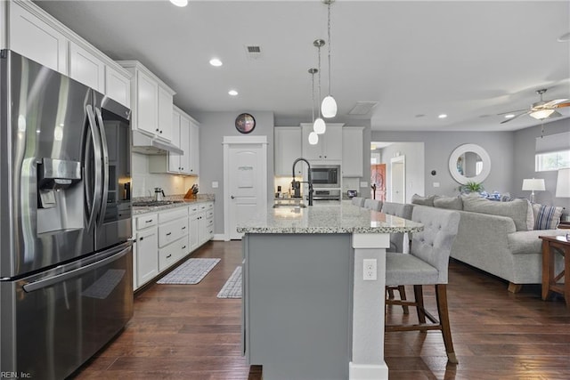 220 Wisdom Path, Chesapeake, VA 23322 - kitchen featuring appliances with stainless steel finishes, recessed lighting, open floor plan, a breakfast bar, and a ceiling fan