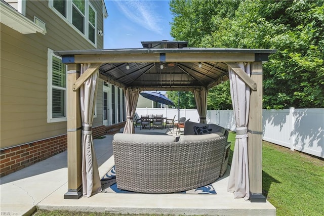 220 Wisdom Path, Chesapeake, VA 23322 - fenced backyard with a gazebo, a patio area, and outdoor dining area