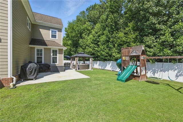 220 Wisdom Path, Chesapeake, VA 23322 - fenced backyard featuring a gazebo, a patio, and a playground