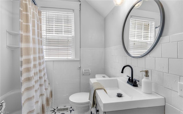 418 Massachusetts Ave, Norfolk, VA 23508 - full bathroom featuring tile walls, vanity, and lofted ceiling