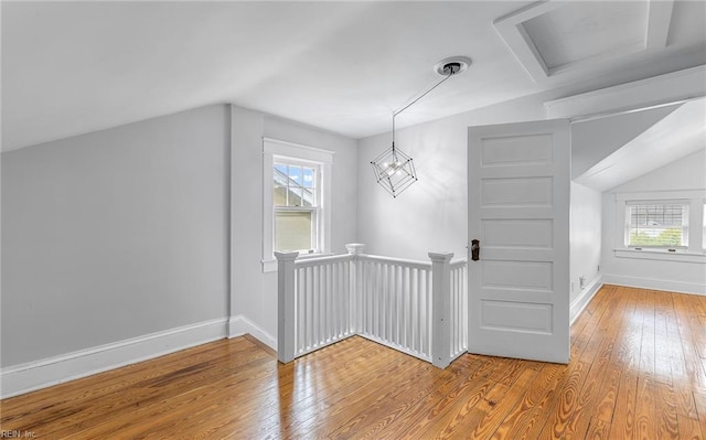 418 Massachusetts Ave, Norfolk, VA 23508 - additional living space featuring hardwood / wood-style floors, plenty of natural light, vaulted ceiling, and attic access