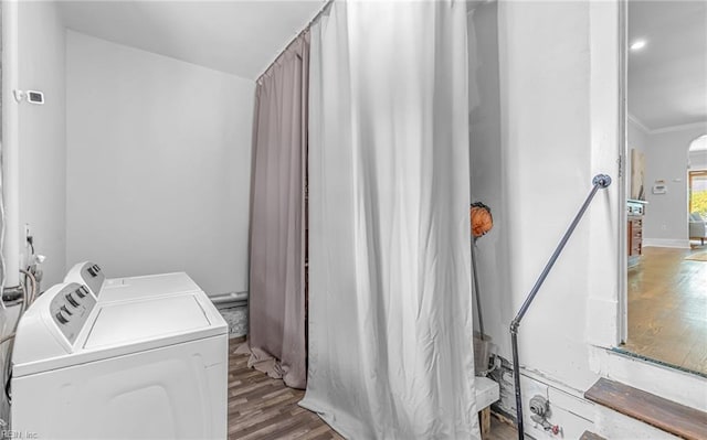 418 Massachusetts Ave, Norfolk, VA 23508 - laundry area featuring washing machine and clothes dryer, light wood-type flooring, and ornamental molding