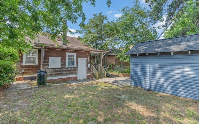 418 Massachusetts Ave, Norfolk, VA 23508 - rear view of property with an outdoor structure and a yard