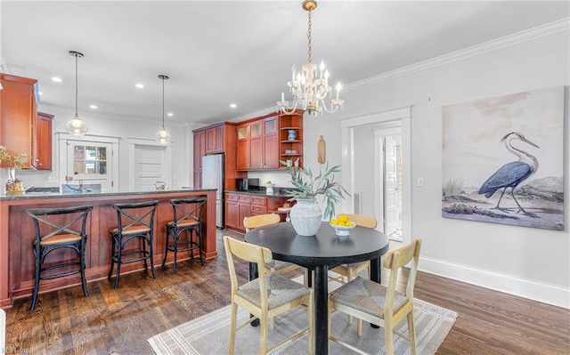 418 Massachusetts Ave, Norfolk, VA 23508 - dining room with dark wood-style floors, ornamental molding, a chandelier, and recessed lighting