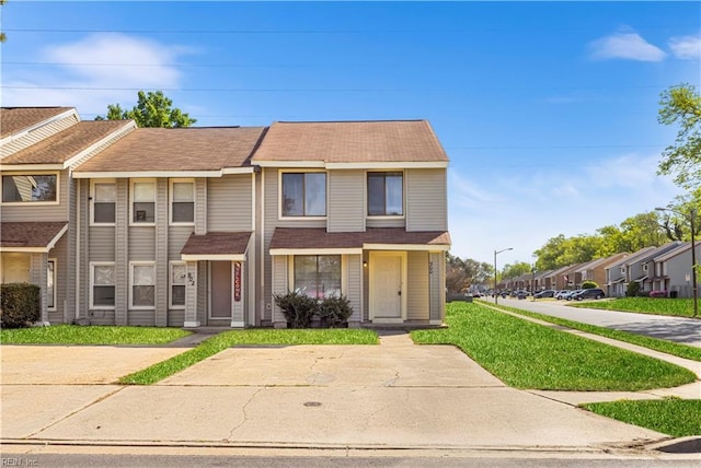 900 Monarch Dr, Virginia Beach, VA 23462 - view of property featuring a front lawn and a shingled roof