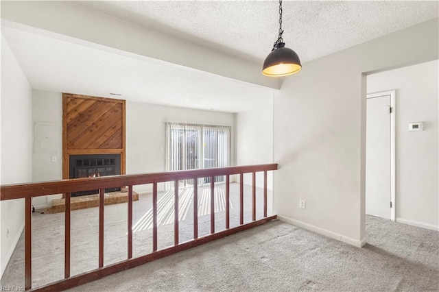 900 Monarch Dr, Virginia Beach, VA 23462 - corridor with carpet flooring and a textured ceiling