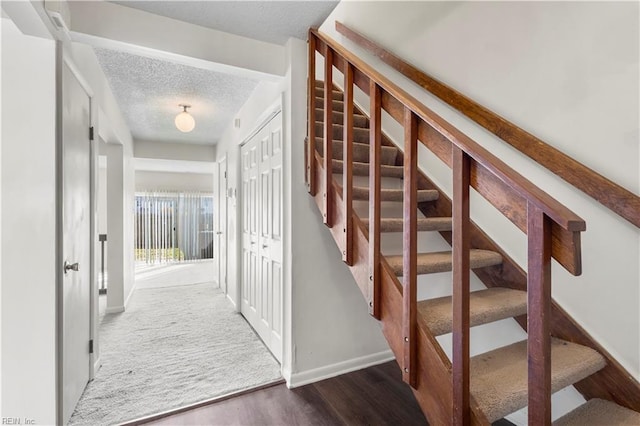 900 Monarch Dr, Virginia Beach, VA 23462 - stairs with wood finished floors and a textured ceiling