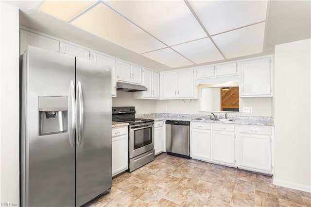 900 Monarch Dr, Virginia Beach, VA 23462 - kitchen featuring appliances with stainless steel finishes, under cabinet range hood, white cabinets, and light stone countertops