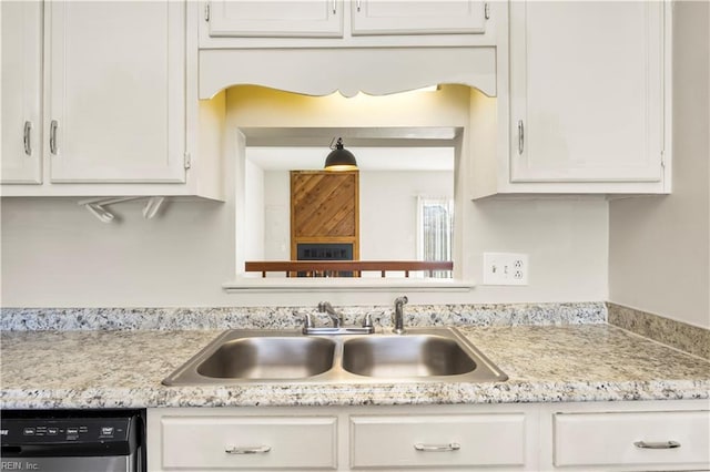 900 Monarch Dr, Virginia Beach, VA 23462 - kitchen with light countertops, dishwasher, and white cabinets