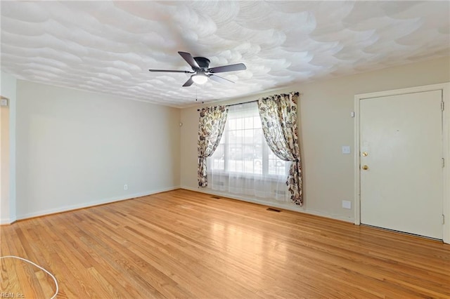 2937 Murray Ct, Norfolk, VA 23518 - empty room featuring a ceiling fan and light wood-style flooring
