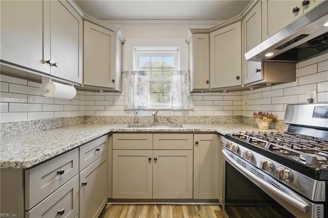 8329 Old Ocean View Rd, Norfolk, VA 23518 - kitchen with gas stove, under cabinet range hood, tasteful backsplash, and light stone counters