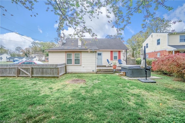 8329 Old Ocean View Rd, Norfolk, VA 23518 - back of property featuring a hot tub and a fenced backyard