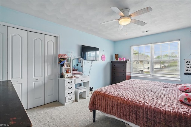 305 Ginkgo Ct, Suffolk, VA 23435 - bedroom featuring light carpet, a closet, and ceiling fan
