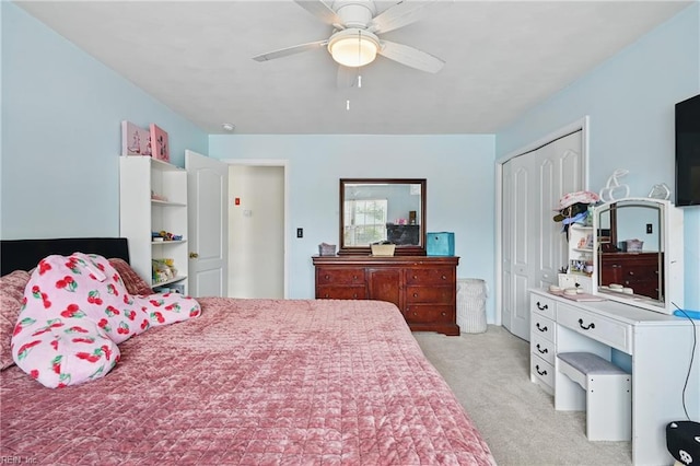 305 Ginkgo Ct, Suffolk, VA 23435 - bedroom featuring light colored carpet, a closet, and a ceiling fan