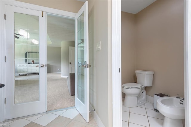 1207 Masers Row, Chesapeake, VA 23320 - bathroom with a bidet, french doors, and tile patterned flooring