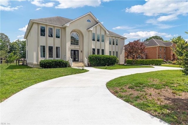 1207 Masers Row, Chesapeake, VA 23320 - view of front of property with curved driveway, stucco siding, and french doors