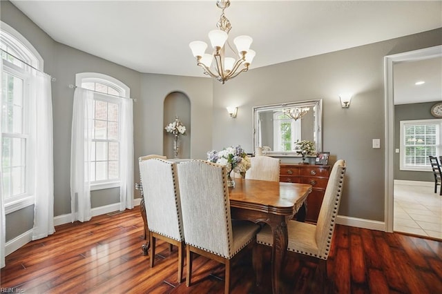 2316 Holland Rd, Virginia Beach, VA 23453 - dining area featuring a chandelier and wood finished floors