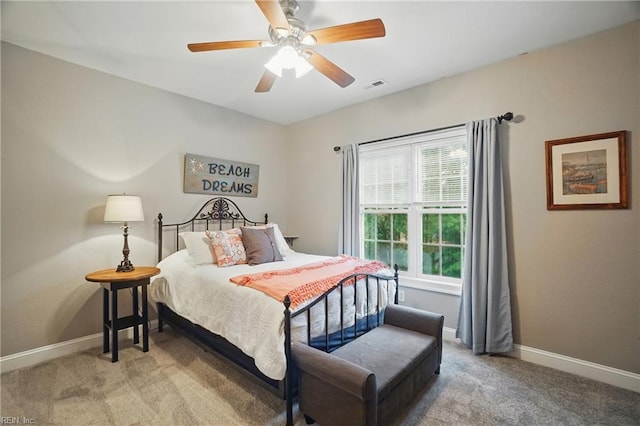 2316 Holland Rd, Virginia Beach, VA 23453 - carpeted bedroom featuring baseboards and a ceiling fan