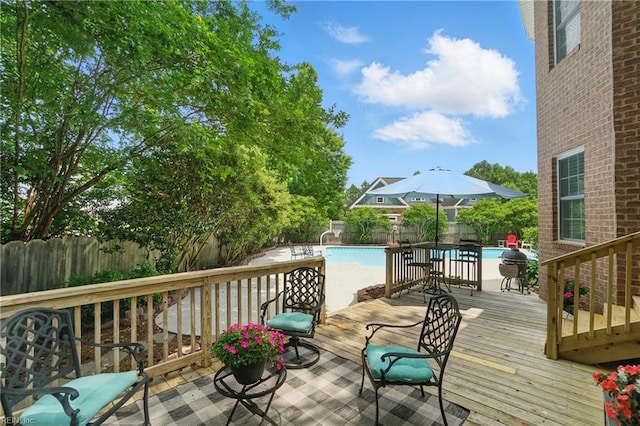 2316 Holland Rd, Virginia Beach, VA 23453 - wooden deck with a fenced backyard and grilling area