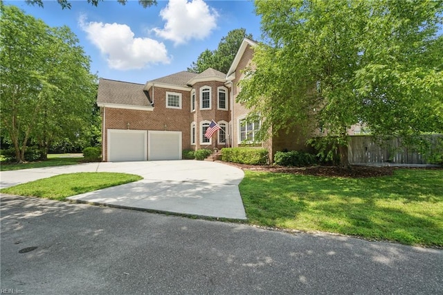 2316 Holland Rd, Virginia Beach, VA 23453 - view of front facade featuring driveway and brick siding